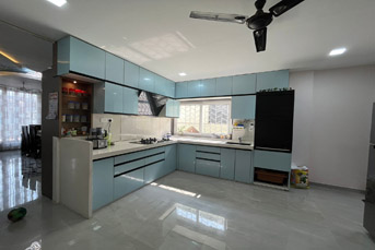 kitchen with rolling shutter by Reflections Interior Studio